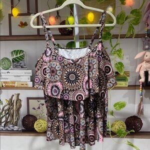 Bohemian swimTop tag says 4 X but measures 23 Ptp. More like Xl